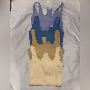 4 NWOT Ribbed Bodysuit Tanks - Lavender, Blue, Tan, Cream size large